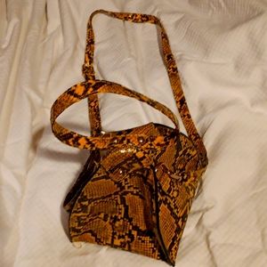 Python pyramid clutch purse